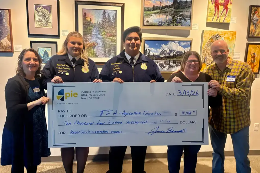Beaver Coach Sales presenting a donation check to Oregon FFA