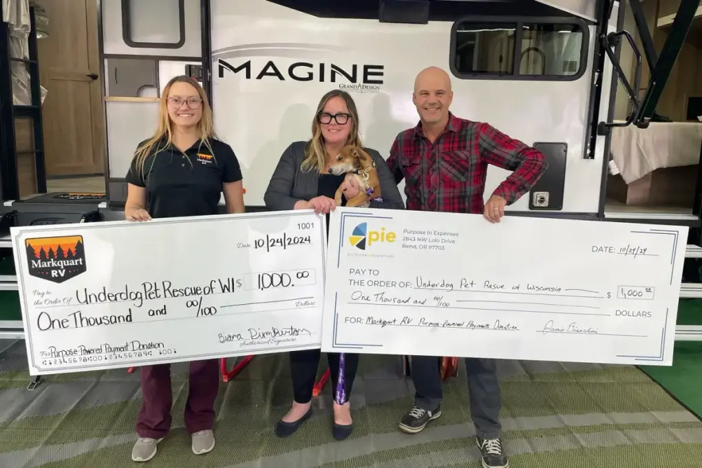 Markquart RV Madison presenting a donation to Underdog Pet Rescue
