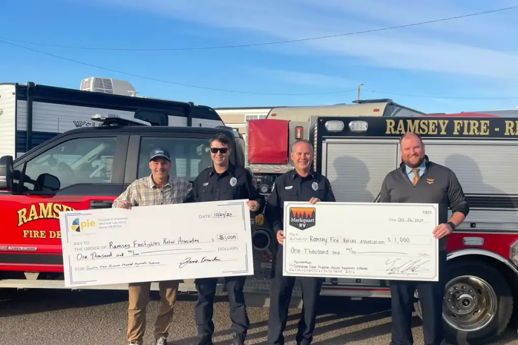Markquart RV Ramsey with local firefighters