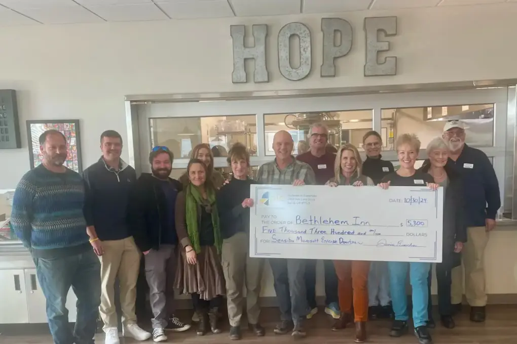 Sensiba and Bethlehem Inn staff with a donation check