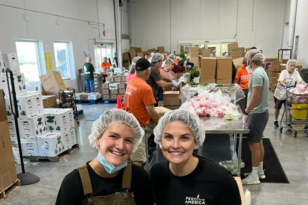 Volunteers packing food